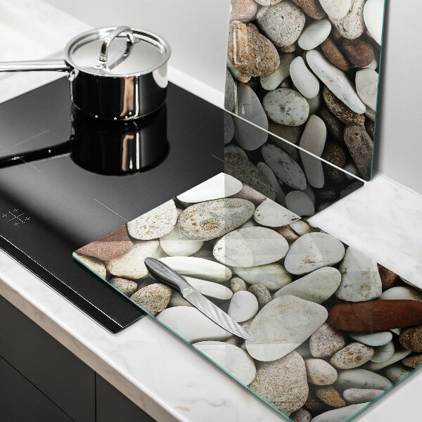 Skleněná krájecí deska Malé kameny pozadí