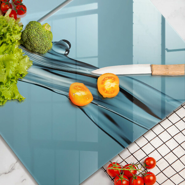 Krájecí prkénko skleněné Voda na modrém pozadí