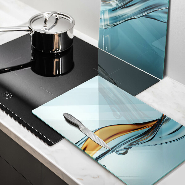 Krájecí prkénko skleněné Voda na modrém pozadí