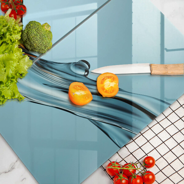 Krájecí prkénko skleněné Voda na modrém pozadí