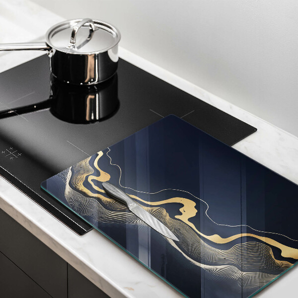 Skleněná deska do kuchyně Abstraktní zlaté čáry