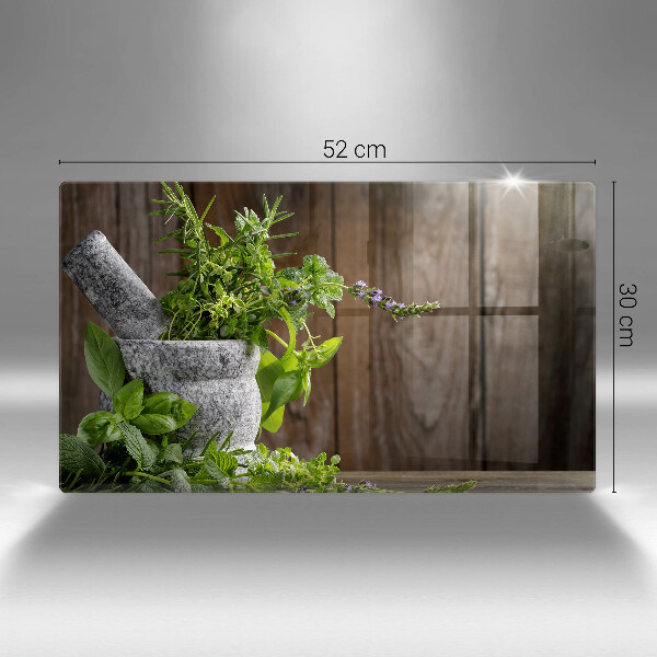 Skleněná deska do kuchyně Pěstuje bylinky a dřevo