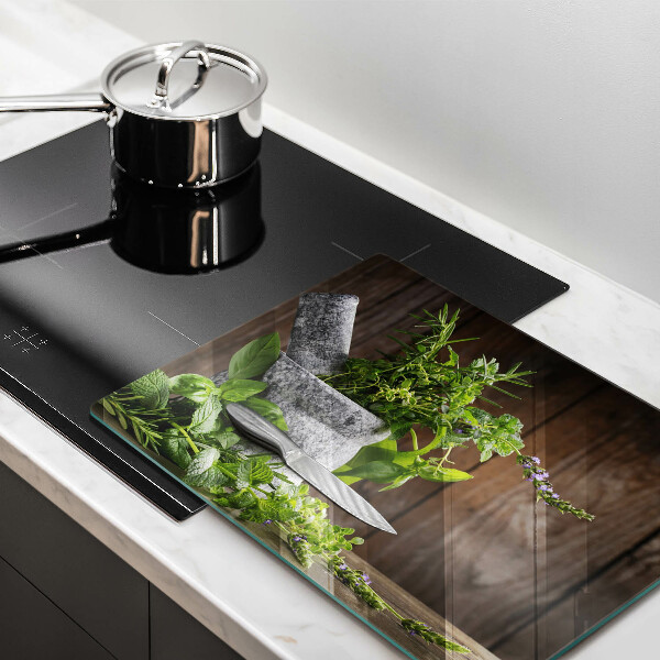 Skleněná deska do kuchyně Pěstuje bylinky a dřevo