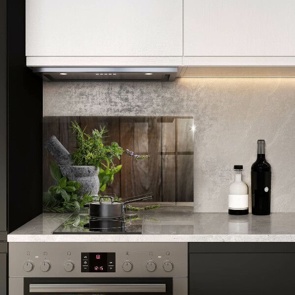 Skleněná deska do kuchyně Pěstuje bylinky a dřevo