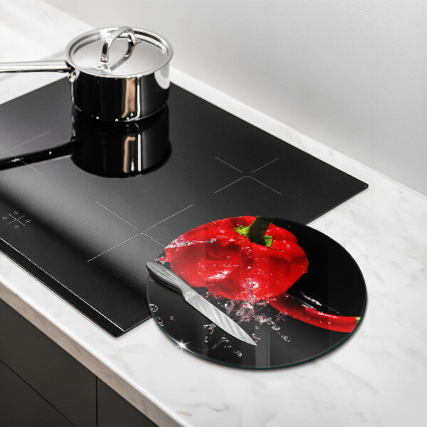 Skleněná deska do kuchyně Červené papriky ve vodě