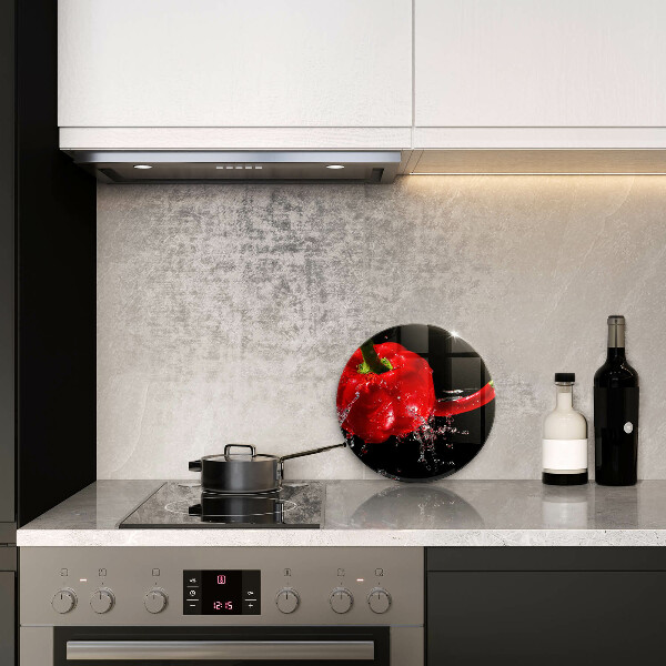 Skleněná deska do kuchyně Červené papriky ve vodě