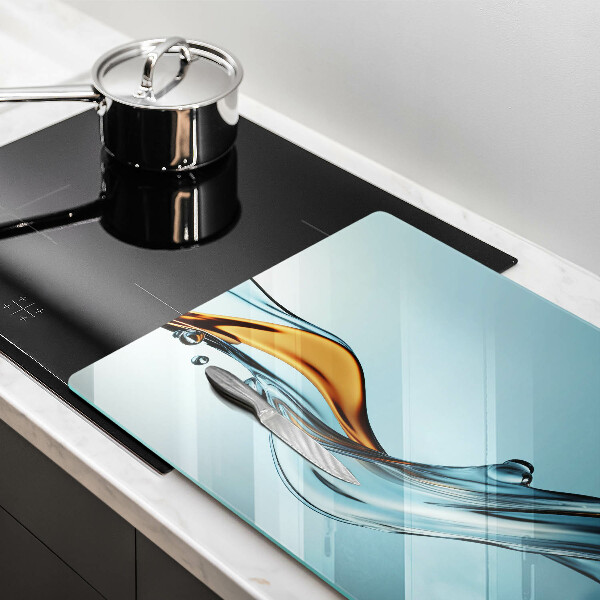 Skleněná deska za sporák Voda na modrém pozadí