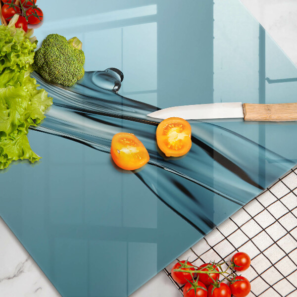 Skleněná deska za sporák Voda na modrém pozadí