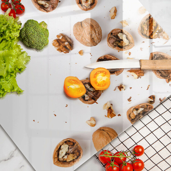 Skleněná deska za sporák Ořechy na bílém pozadí