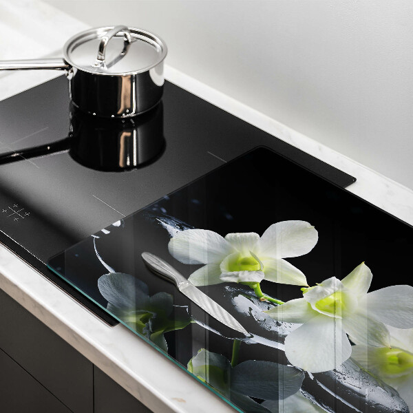 Skleněná deska za sporák Bílé květy v zenové vodě