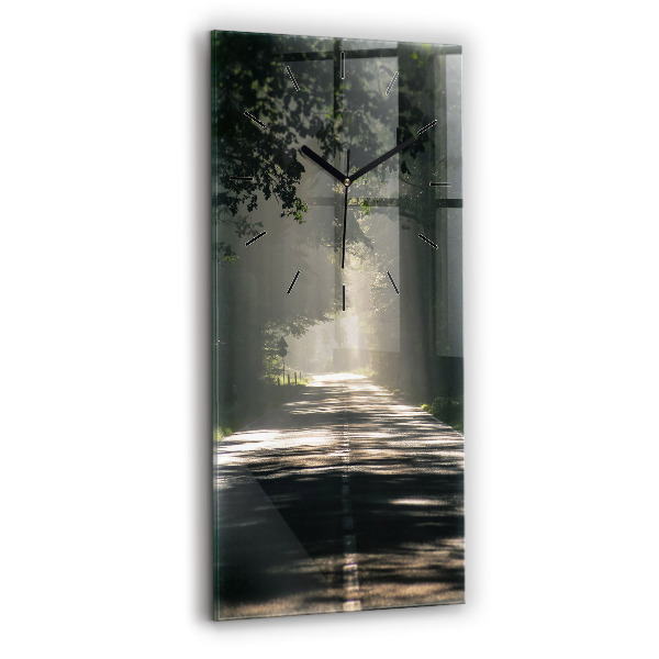 Vertikální nástěnné hodiny Lesní cesta a pruhy slunce
