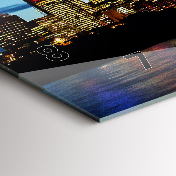 Horizontální hodiny na skle Sydney večer