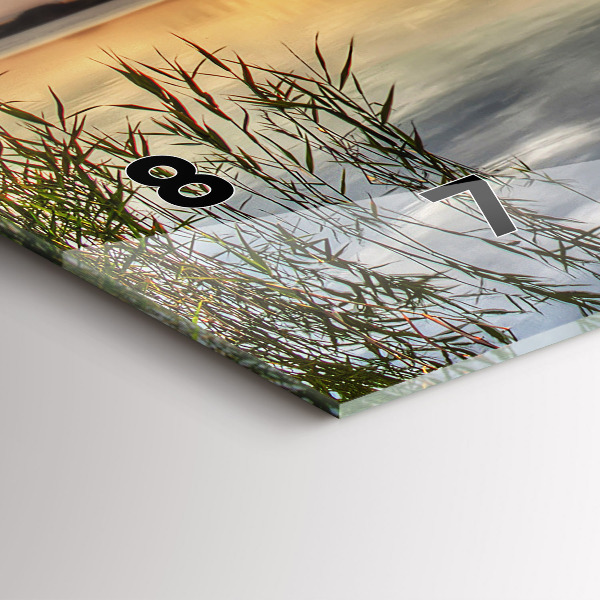 Horizontální hodiny na skle Jezero se západem slunce