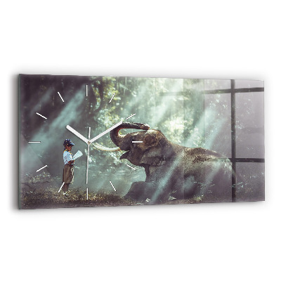 Horizontální skleněné hodiny na stěnu Chlapec si čte knihu