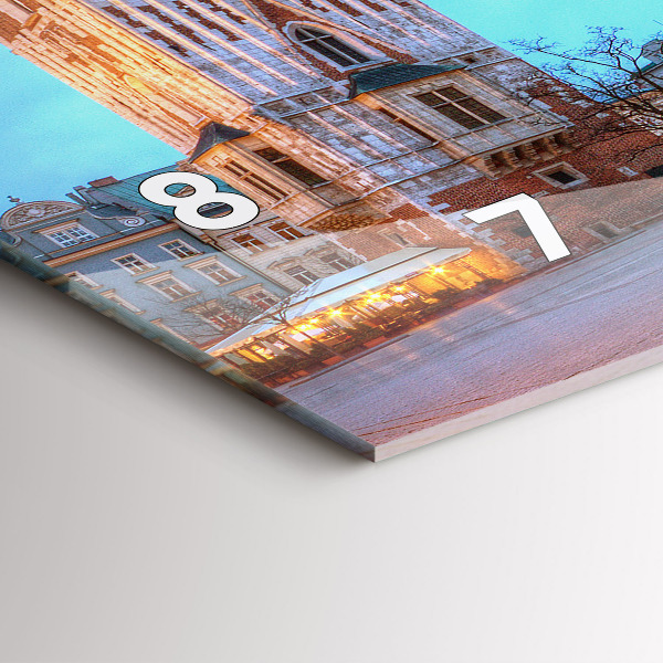 Horizontální hodiny na skle Hlavní náměstí v Krakově