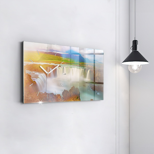 Horizontální hodiny na skle Godafoss na Islandu