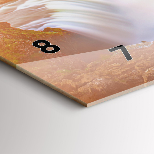 Horizontální hodiny na skle Godafoss na Islandu