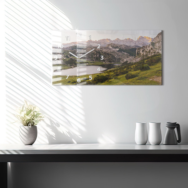 Horizontální hodiny na skle Jezero a hory Pyrenejí