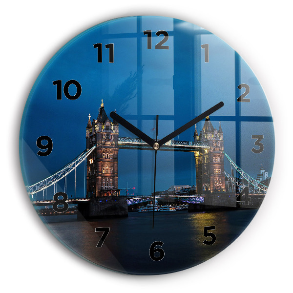 hodiny na skle Tower Bridge Londýn v noci